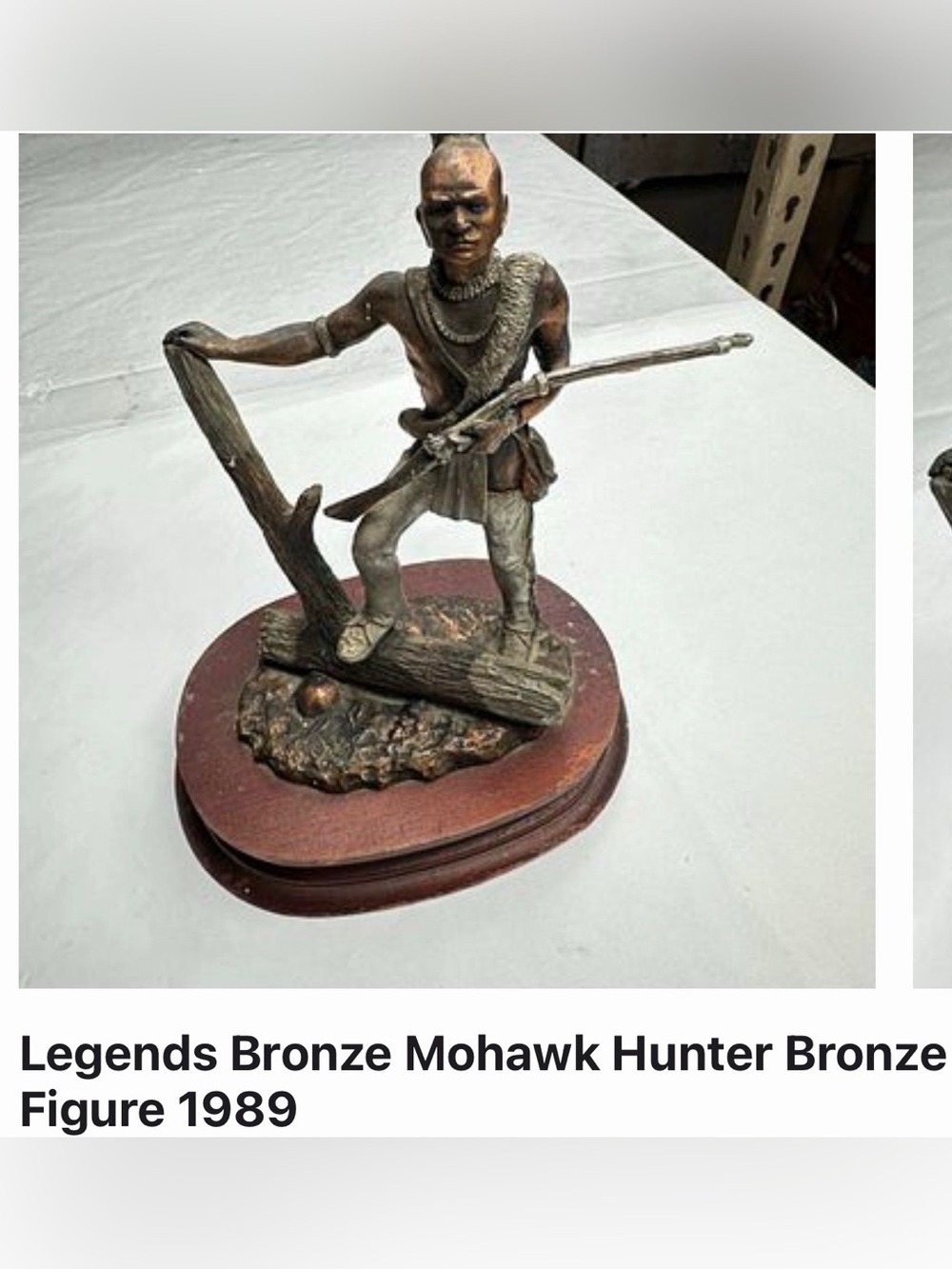 Legends bronze sculpture of a Mohawk Hunter
by artist Jim Ponter from 1989
